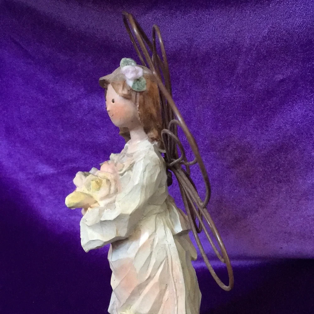 Resin Angel Holding Basket of Flowers